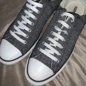Black and white plaid Converse sneakers.